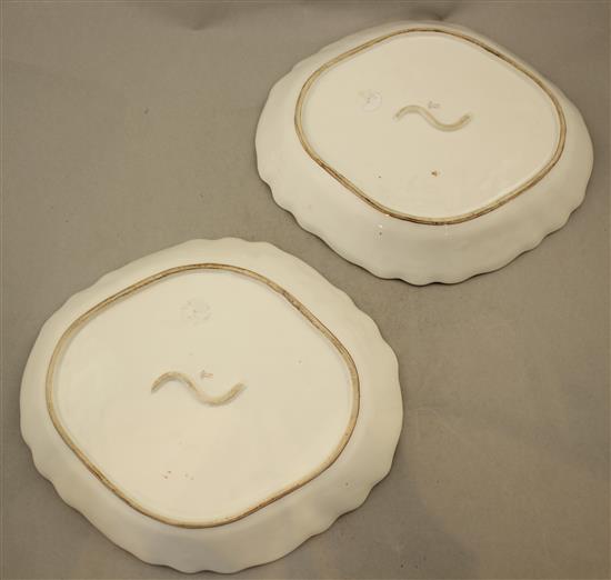 A pair of Capo di Monte style lozenge shaped dishes, probably Richard Ginori, late 19th century, 26cm